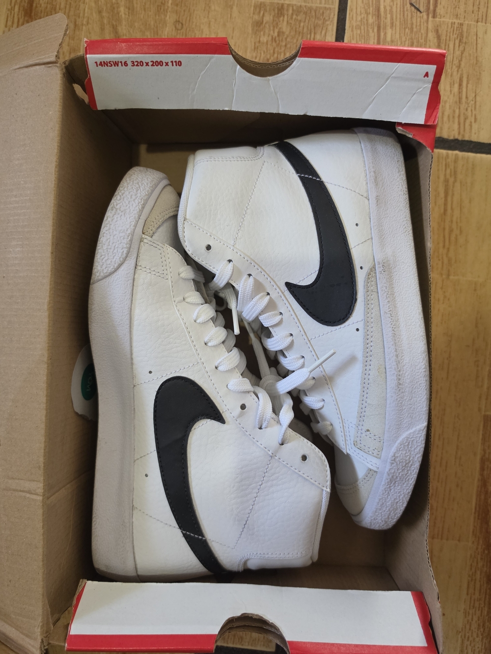 Nike Blazer White High-Top Sneakers with Black Swoosh